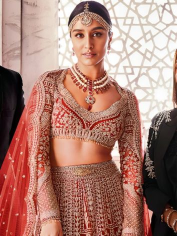 Shraddha Kapoor in plunging neck full sleeve blouse for Winter Weddings