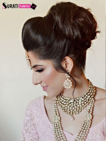50+ Modern Hairstyles for Lehenga that Will Add An extra Oomph to Your Look Front Puff Bun Lehenga Style