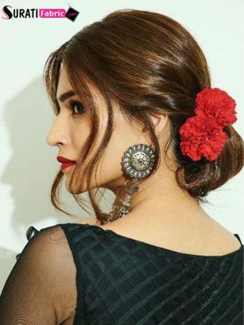 50+ Modern Hairstyles for Lehenga that Will Add An extra Oomph to Your Look Fashion Kriti Sanon With Sleek Low Bun with Rose