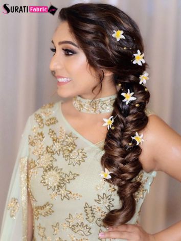 50+ Modern Hairstyles for Lehenga that Will Add An extra Oomph to Your Look Western French Braid with Flowers for lehenga style