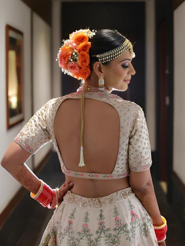 Cutout Style Lehenga Blouse Back design with Embellished Tassels