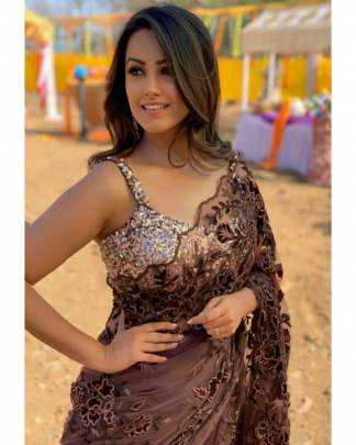 BUTTERY FLY HEAVY NET WITH EMBROIDERY WORK  COMES  ON  PALLU AND SKIRT  ALSO 