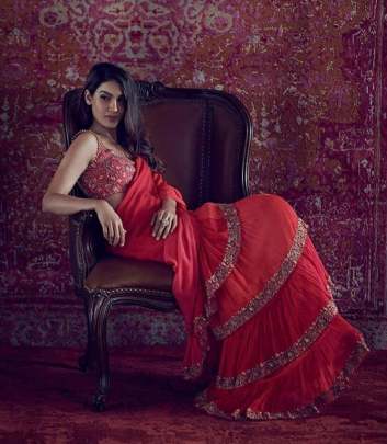 GEORGETTE WITH EMBROIDERY WORK WITH DAYMOND HAND WORK WITH RUFFLE 