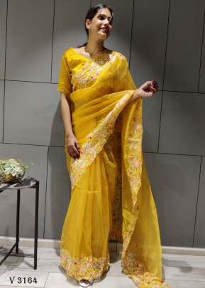 Organza Silk Saree In Turmeric Yellow By Surati Fabric