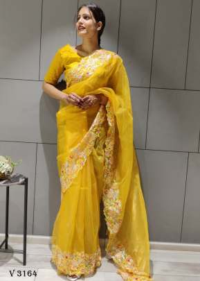 Organza Silk Saree In Turmeric Yellow By Surati Fabric