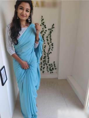 PURE SOFT GEORGETTE SAREE IN TURQUOISE COLOR 