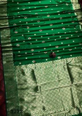 Pari Lichi Silk Saree with Broad Golden Border In Green Color By Surati Fabric 