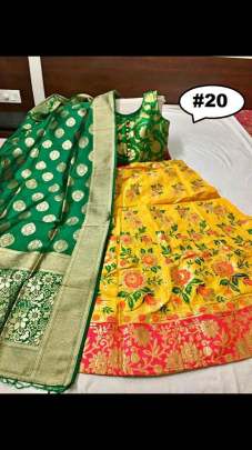 Rasleela Vol 10 Lehenga yellow and Duptta Green