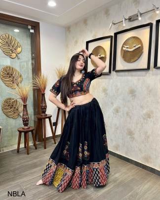 BLACK Presenting a perfectly blended endless array of patterns  designs  color   print work and lehariya print dupatta  NBLA