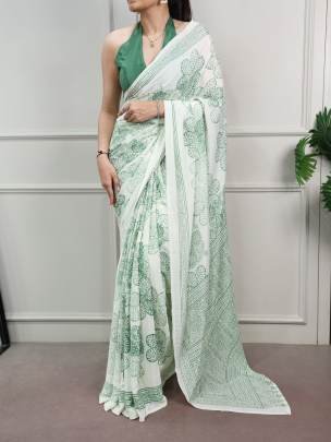 Classic beauty redefined with its silky smooth texture and artistic floral detailing, this saree is the perfect blend of tradition and trend YNF7210PS