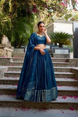Crafted for Grace and Beauty Pure Chanderi Plain Lehenga with Intricate Zari Work Border, Accompanied by Sequin Embellished Dupatta 