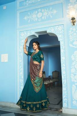 Grace that speaks for itself  Crafted in luxurious Vichitra silk  this lehenga brings a refined and royal touch to your festive wardrobe LNB1205TEL