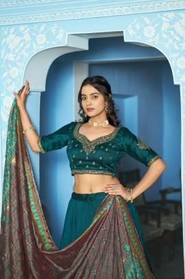 Grace that speaks for itself  Crafted in luxurious Vichitra silk  this lehenga brings a refined and royal touch to your festive wardrobe LNB1205TEL