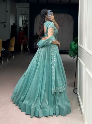 Intricate beads and fine thread embroidery come together to create a lehenga that feels effortlessly regal and festive