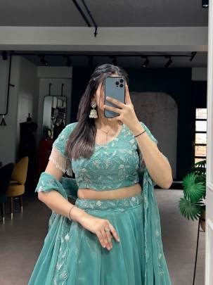 Intricate beads and fine thread embroidery come together to create a lehenga that feels effortlessly regal and festive