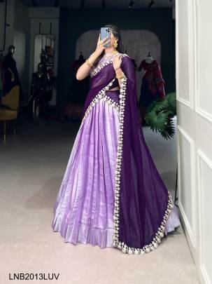 Lavender Wearing a Jacquard lehenga choli is not just about donning attire, where traditional motifs meet modern silhouettes LNB2013LUV