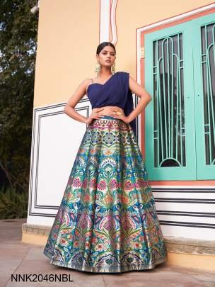 NAVY BLUE In the ethereal folds of the Banarasi lehenga, traditional weaves its magic, casting a spell that transcends eras????.NNK2046NBL