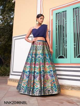 NAVY BLUE In the ethereal folds of the Banarasi lehenga, traditional weaves its magic, casting a spell that transcends eras????.NNK2046NBL