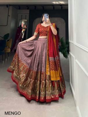 Onion Pink Elevate your ethnic game with this breathtaking tussar silk lehenga choli featuring stunning Kashmiri print. Perfect for any special occasi