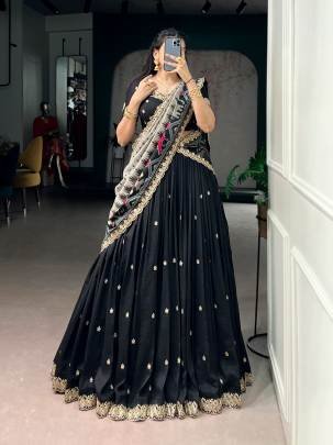 Rich Vichitra silk graceful flair and the timeless charm of Tussar silk come together to create a lehenga that speaks pure sophistication LNB1204BLK