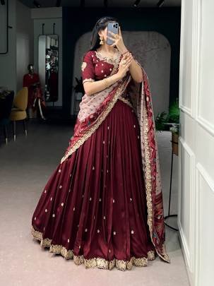 Rich Vichitra silk graceful flair and the timeless charm of Tussar silk come together to create a lehenga that speaks pure sophistication LNB1204MRN