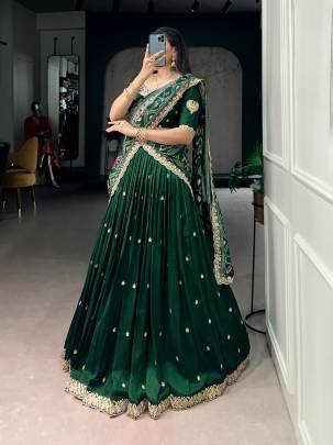 Rich Vichitra silk graceful flair and the timeless charm of Tussar silk come together to create a lehenga that speaks pure sophistication LNB1204GRN