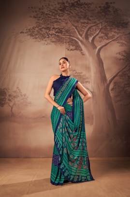 Soft elegance meets everyday grace in this beautifully printed poly mal cotton saree YNF7201FRZ