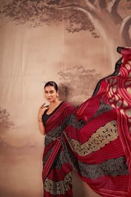 Soft elegance meets everyday grace in this beautifully printed poly mal cotton saree YNF7201RED