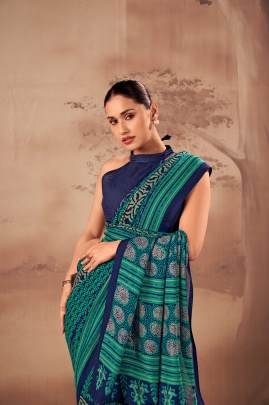 Soft elegance meets everyday grace in this beautifully printed poly mal cotton saree YNF7201FRZ
