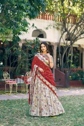 Soft tasar silk drape with radiant foil motifs    a lehenga that shines with understated luxury LNB1256OWT