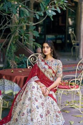 Soft tasar silk drape with radiant foil motifs    a lehenga that shines with understated luxury LNB1256OWT