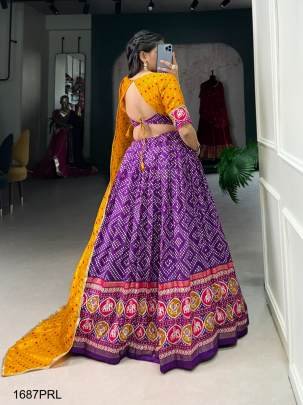 This beautifully Purple printed  lehenga design going from a royal shade ensemble for function LNB1687PRL