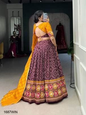 This beautifully Wine printed  lehenga design going from a royal shade ensemble for function LNB1687WIN