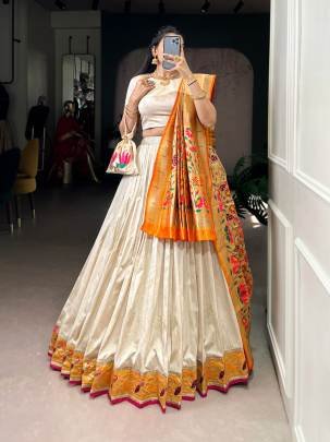 This Silk Paithani lehenga choli is where traditional zari weaving meets graceful lace borders crafted for moments that deserve royalty LNB2031CRM