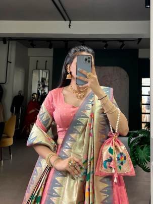 This Silk Paithani lehenga choli is where traditional zari weaving meets graceful lace borders crafted for moments that deserve royalty LNB2031PEC