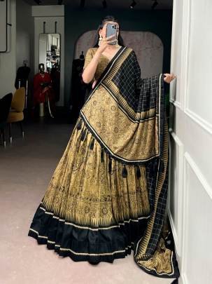 Tradition woven in art Kalamkari prints on rich Tasar silk finished with elegant lace borders for a timeless ethnic statement LNB1206GLD