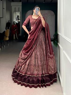 Tradition woven in art Kalamkari prints on rich Tasar silk finished with elegant lace borders for a timeless ethnic statement LNB1206MRN