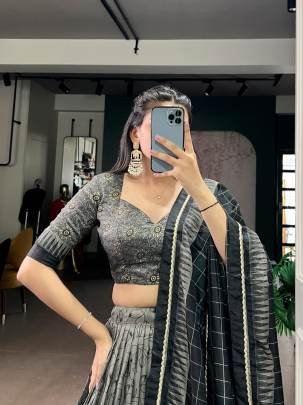 Tradition woven in art Kalamkari prints on rich Tasar silk finished with elegant lace borders for a timeless ethnic statement LNB1206GRY