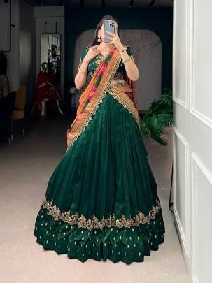 When detailed thread embroidery meets soft shimmer on Vichitra silk  a perfect lehenga choli for weddings   festivals LNB1202GRN 