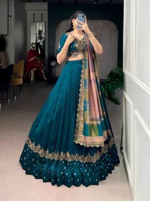 When detailed thread embroidery meets soft shimmer on Vichitra silk  a perfect lehenga choli for weddings   festivals LNB1202FRZ