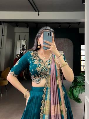 When detailed thread embroidery meets soft shimmer on Vichitra silk  a perfect lehenga choli for weddings   festivals LNB1202FRZ