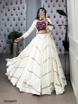 WHITE Graceful, glamorous, and rooted in culture — the perfect pick for Garba night! NNKI1625WHT