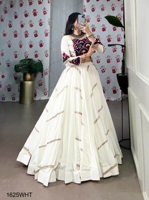 WHITE Graceful, glamorous, and rooted in culture — the perfect pick for Garba night! NNKI1625WHT