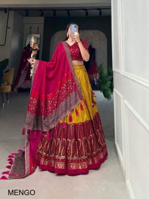 Yellow Elevate your ethnic game with this breathtaking tussar silk lehenga choli featuring stunning Kashmiri print. Perfect for any special occasion M